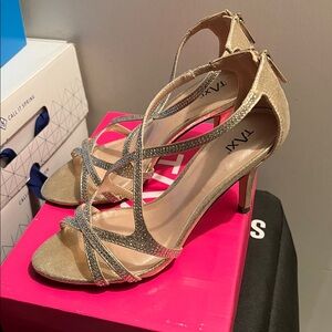 Elegant Gold Strappy Heels by Taxi